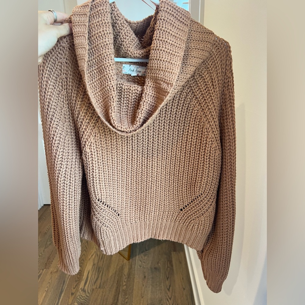 Brown turtleneck sweater. Size Medium, fits like a S/M.